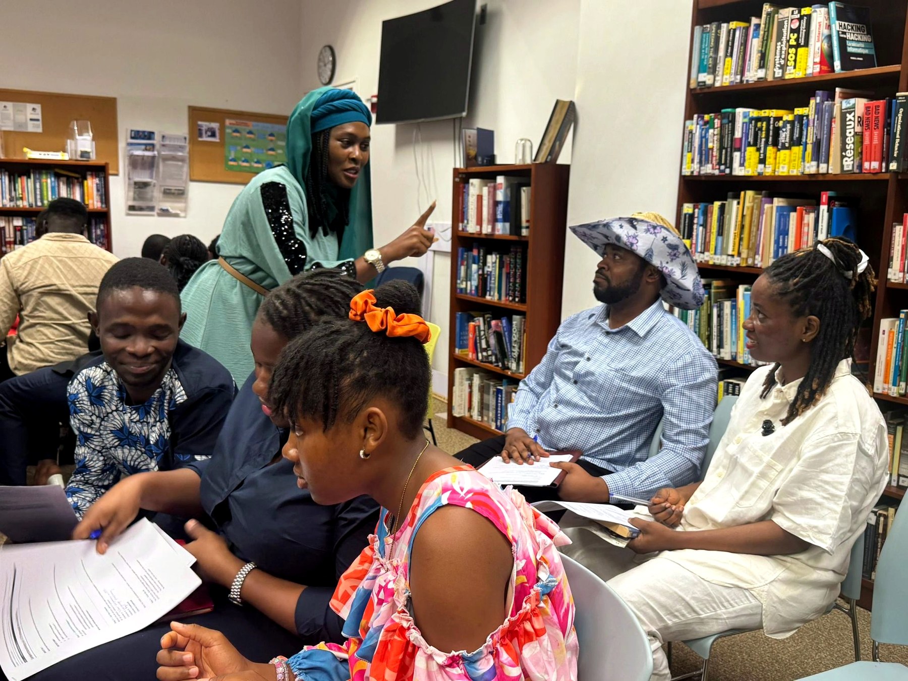 MelXBuji leading a workshop and leadership session at the American Center